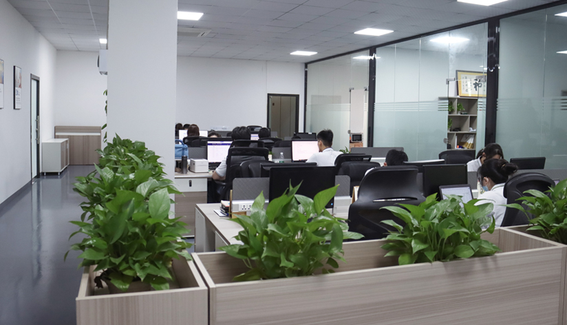 Video Telephone brand office – CHEETA modern workspace with green plants.
